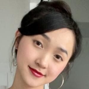 Clara Dao smiling in front of the camera